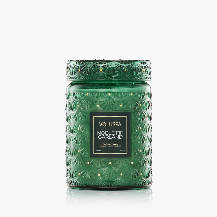 Voluspa Noble Fir Garland Large Jar Candle in embossed emerald green glass with matching decorative lid