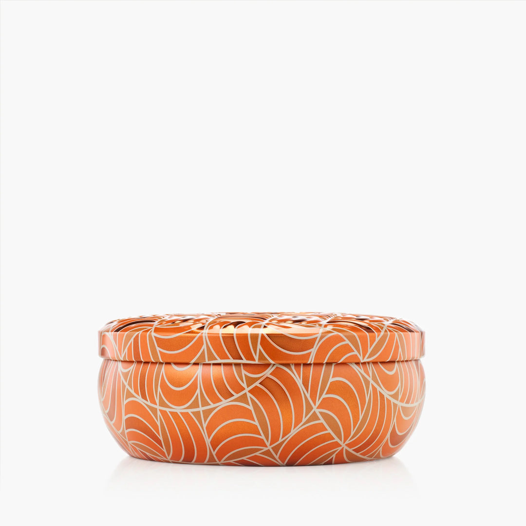 Closed Voluspa Spiced Pumpkin Latte 3 Wick Tin Candle in orange and cream patterned vessel