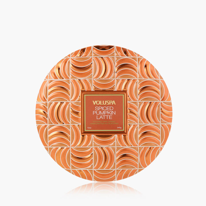Top view of Voluspa Spiced Pumpkin Latte 3 Wick Tin Candle in decorative orange patterned tin