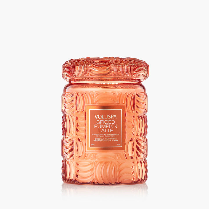 Voluspa Spiced Pumpkin Latte Large Jar Candle in embossed orange glass with decorative lid