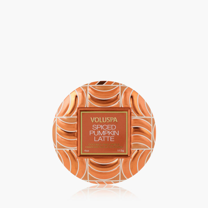 Top view of Voluspa Spiced Pumpkin Latte Mini Tin Candle in decorative orange patterned tin