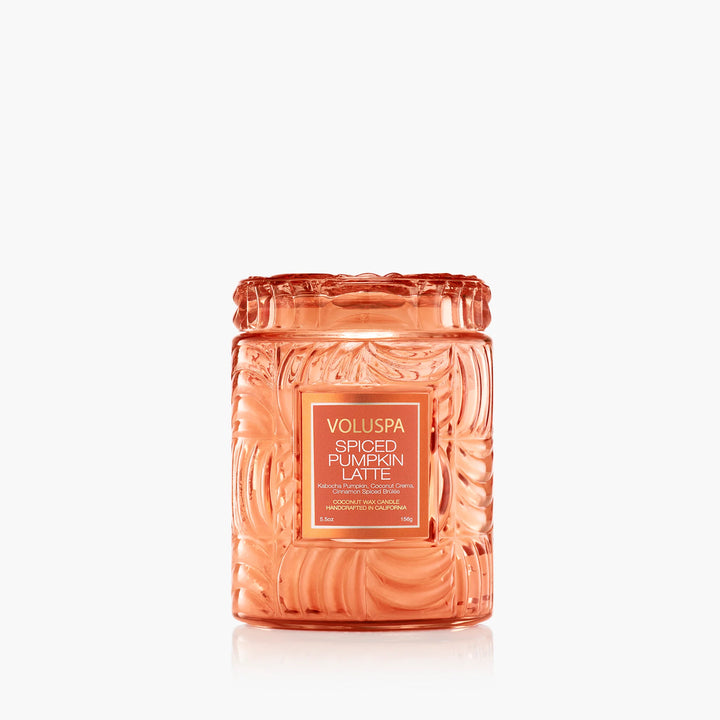Voluspa Spiced Pumpkin Latte Small Jar Candle in embossed orange glass with decorative lid